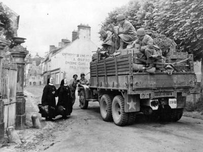 US Infantry in truck liberated Bricquebec Normandy 1944