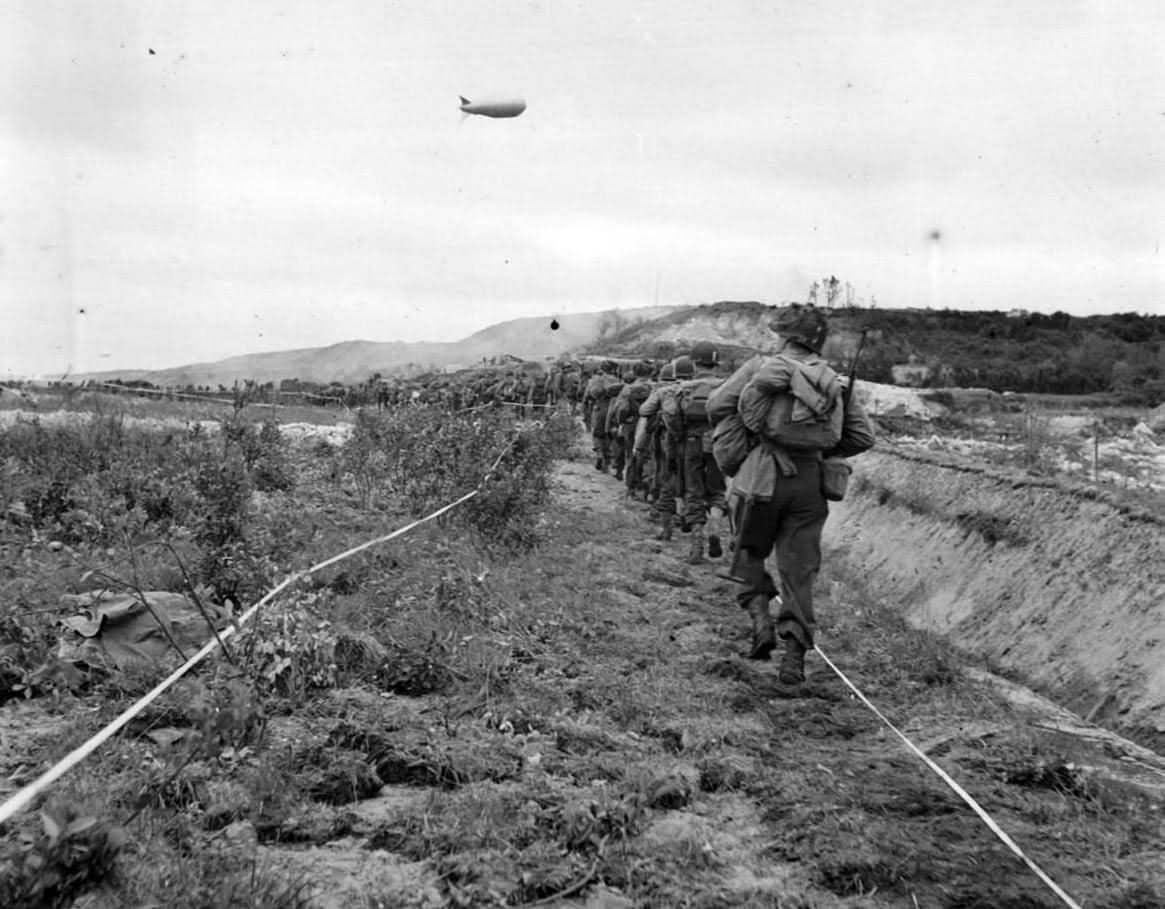 US Infantrymen Advance thru German Minefield in Normandy 1944