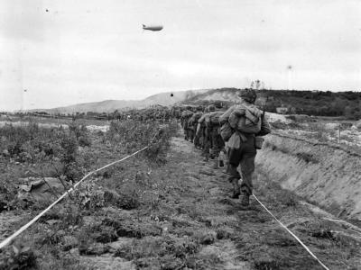 US Infantrymen Advance thru German Minefield in Normandy 1944