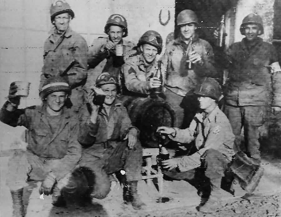 US Troops Celebrate with French Wine in Normandy 1944