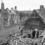 French Civilians and Firemen Start Reconstruction in Carentan Normandy 1944