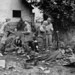 German and US Medics Tend Wounded German POWs in St. Lo Normandy 1944