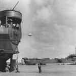 Landing Ship, Tank USS LST-326 and LST-388 Unloading on Normandy Beach during Low Tide June 1944