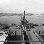 Mulberry harbour A off D-Day Omaha Beach in background at Saint-Laurent-sur-Mer