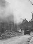 Photo Fireman Put Out Fire in Carentan Normandy France 1944