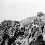 Rangers rest atop the cliffs at Pointe du Hoc 6 June 1944