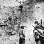 Rangers with ladders used to storm cliffs at Pointe du Hoc