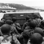 Troops in an LCVP landing craft approaching Omaha Beach on D Day 6 June 1944