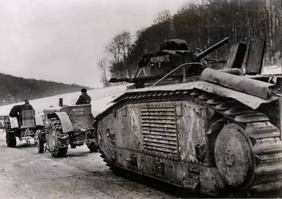 Char B1 bis being towed by a tractors