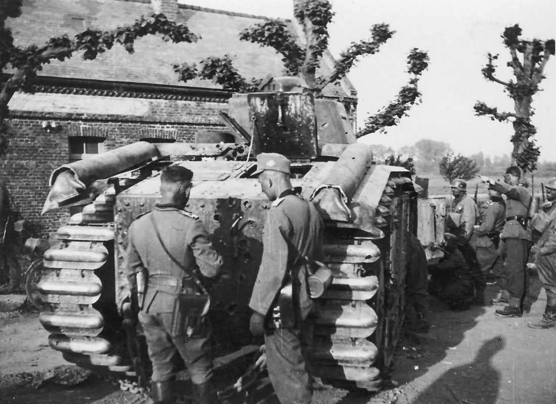 German soldiers examining knocked out Char B1 bis tank