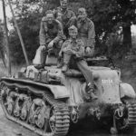 Wehrmacht soldiers atop Renault R35 registration number 50560