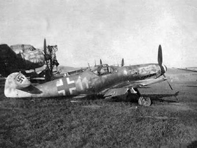 Abandoned Bf 109 G yellow 11 and Ju88 Night Fighter 1945