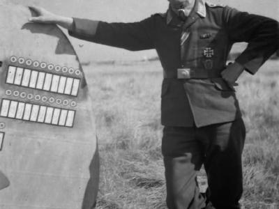pilot Werner Machold by the tail of his Bf 109 JG2