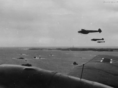 Me110 in flight over sea