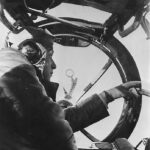 German Gunner Manning Machine Gun in Nose of He111