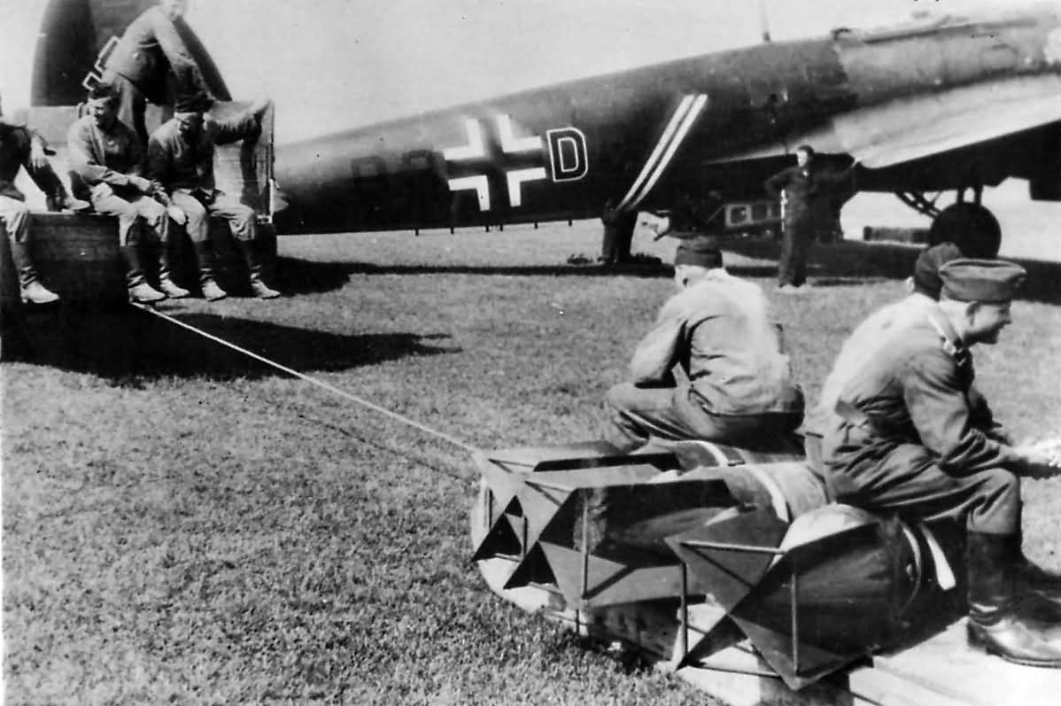 German Crew Hauling Bombs to Heinkel He 111 of KG 54 Totenkopf 1940
