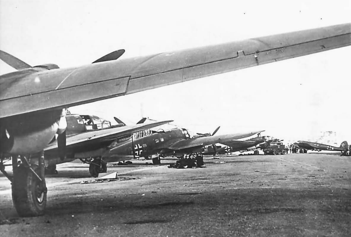 Line of German Heinkel He 111 of KG 26 on airfield in Italy 1941