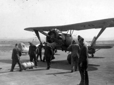 Luftwaffe ground personnel prepare to start Hs123 B