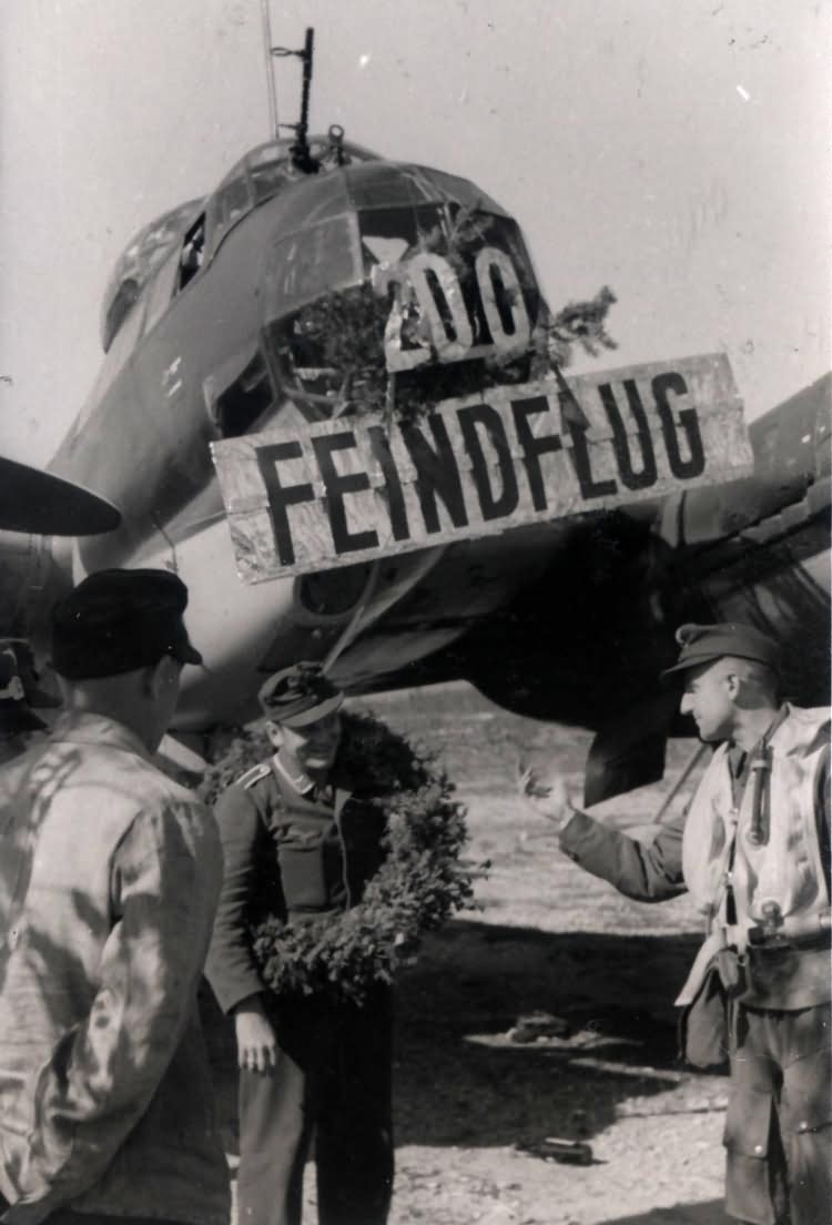 The crew of this Ju 88 celebrate their 200th flight