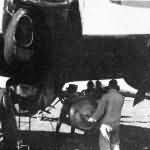 Ju88 bomber – groundcrew load up a bomb on the underwing racks