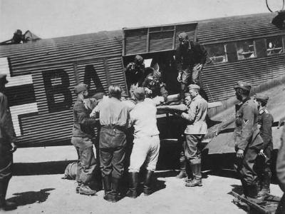 Wounded are off-loaded from a Junkers Ju 52 MEDEVAC