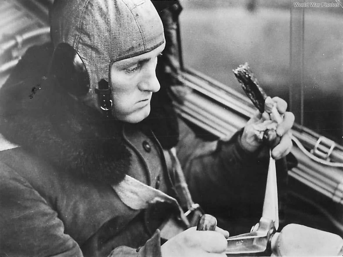 German pilot eats pemmican sausage in Bf 110 cockpit ’40