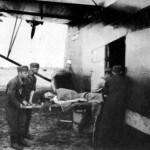 Wounded soldier being unloaded from a Me323