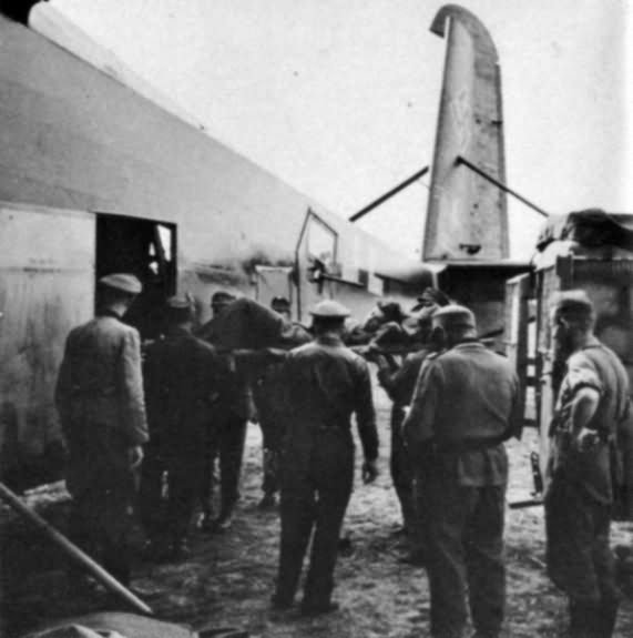 Wounded soldier being unloaded from a Me323 aircraft