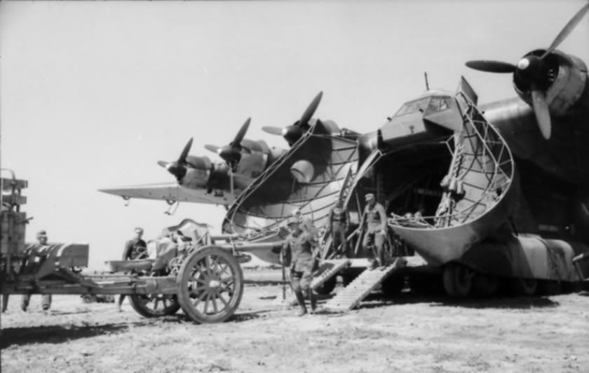 Loading of a leFH 18 onto Me 323, Italy 1942