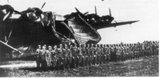 German soldiers stand before boarding a Me 323