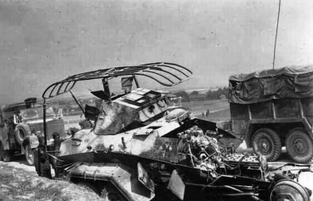 The charred remnants of a German Sd Kfz 231 6-rad panzerspahwagen