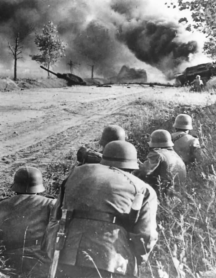 German Soldiers and Burning Soviet Tank on Eastern Front 1941