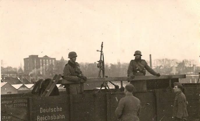 Wehrmacht Soldiers with MG34 AA Machine Gun Set Up on Railway Car