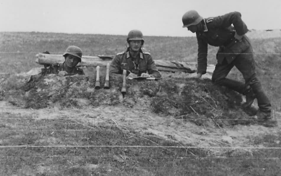 wehrmacht soldiers with handgranaten in a trench on the Eastern front
