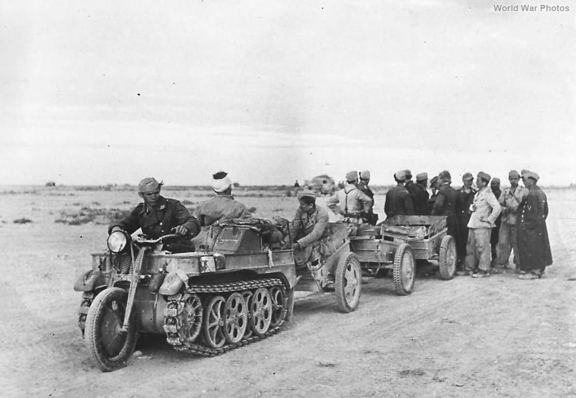 Italian soldiers ride SdKfz 2 to surrender to British in Egypt ’42