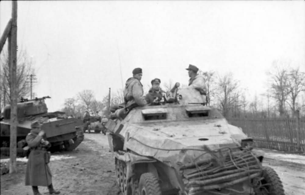 eastern front SdKfz 251 Schutzenpanzer and destroyed soviet M4 Sherman 1944