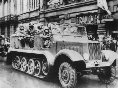 German Troops in SdKfz 6 Towing 10,5 cm leFH 18 in Prague 1939
