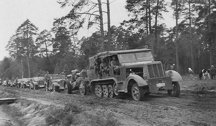 German medium halftrack Sdkfz 7 towing gun