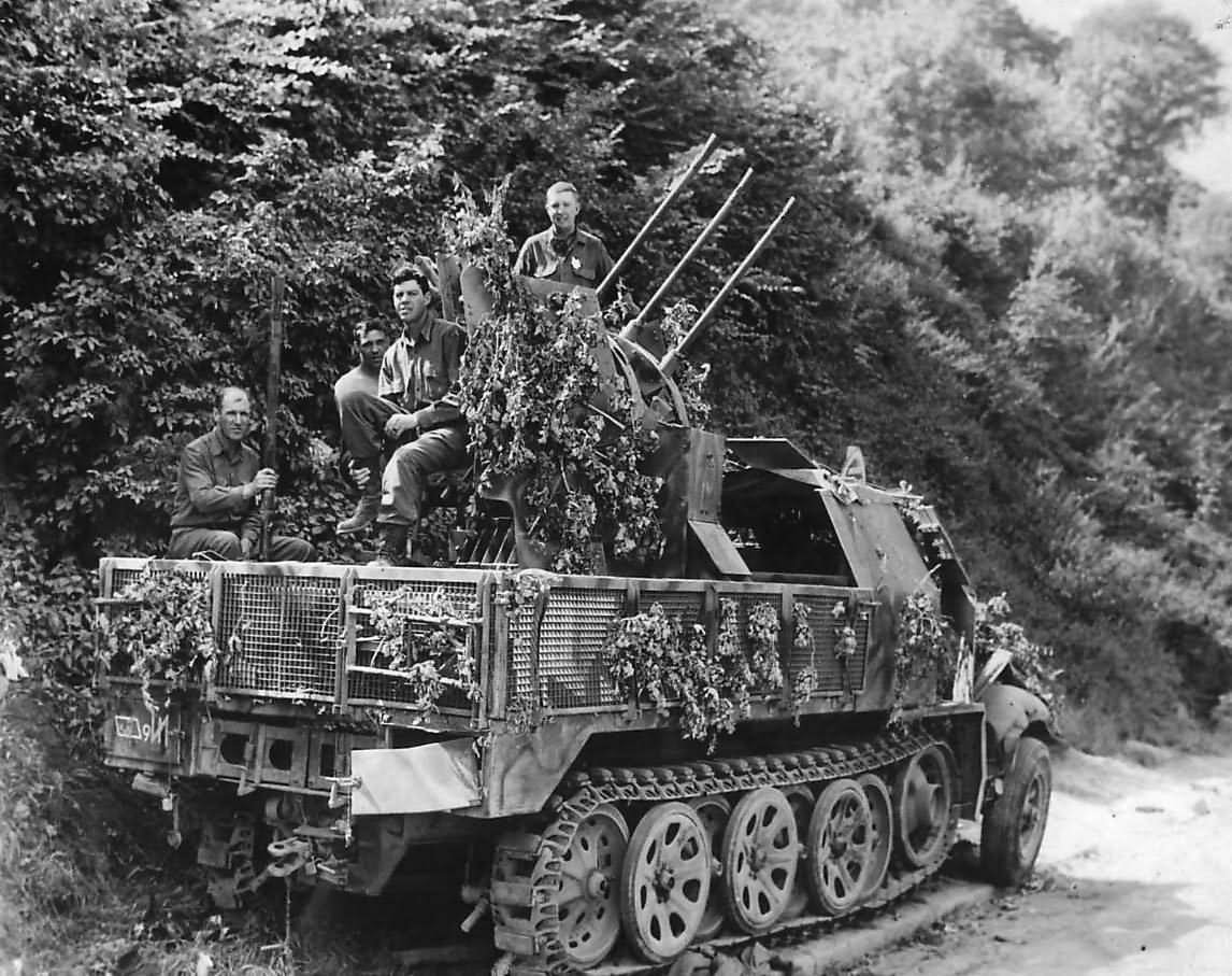 US troops atop SdKfz 7/1 of the 2.SS-Panzer-Division Das Reich in Normandy