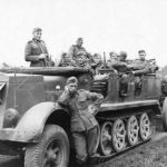 Armored SdKfz 7 towing a sFH 18