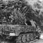 US troops atop SdKfz 7/1 of the 2.SS-Panzer-Division Das Reich in Normandy