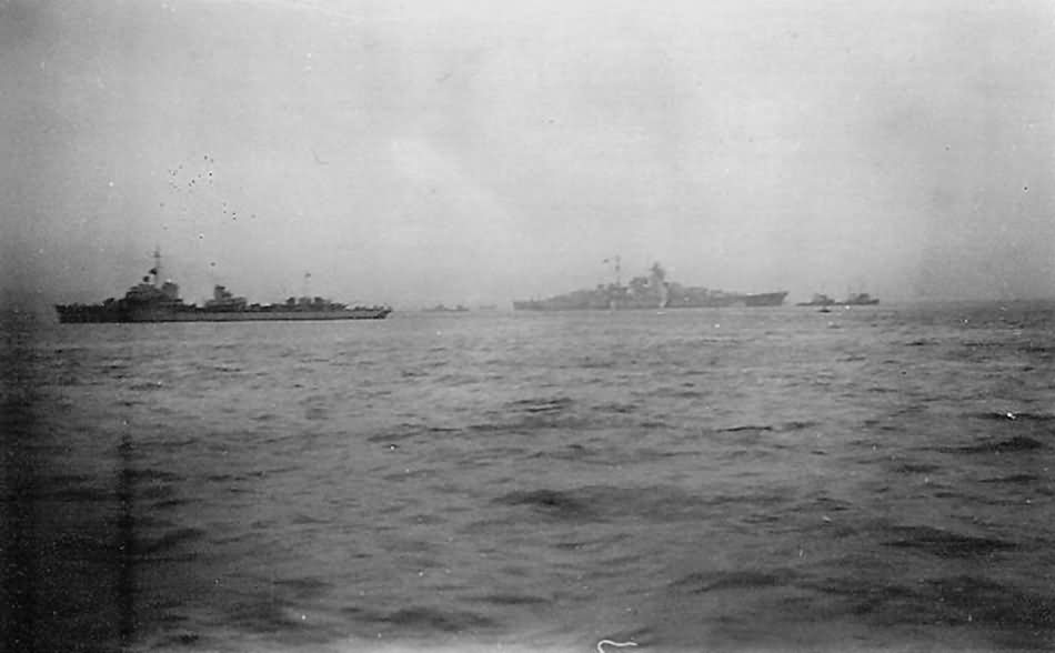 Battleship Bismarck escorted by several destroyers