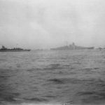 Battleship Bismarck escorted by several destroyers