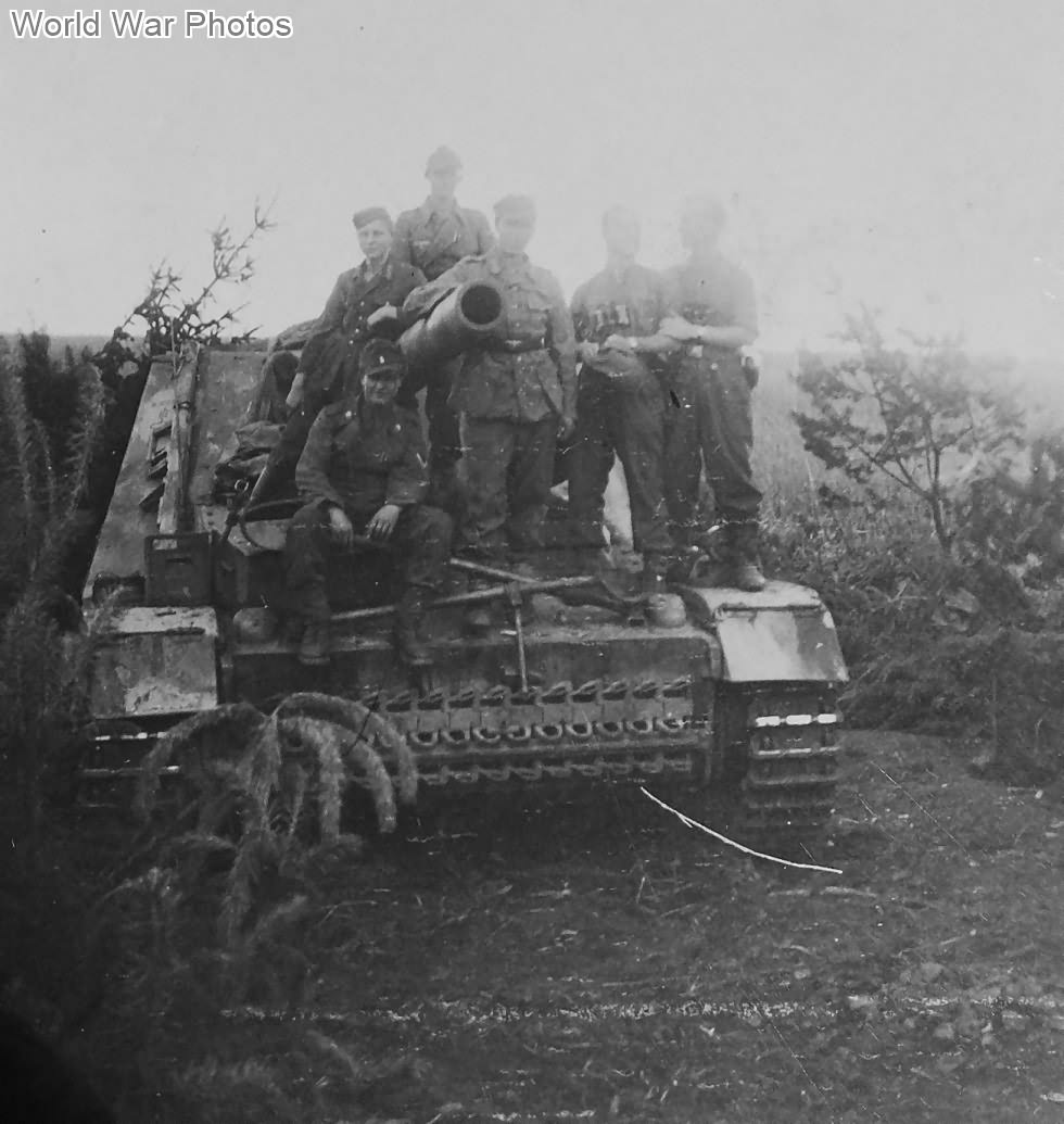 Crew atop a Hummel howitzer