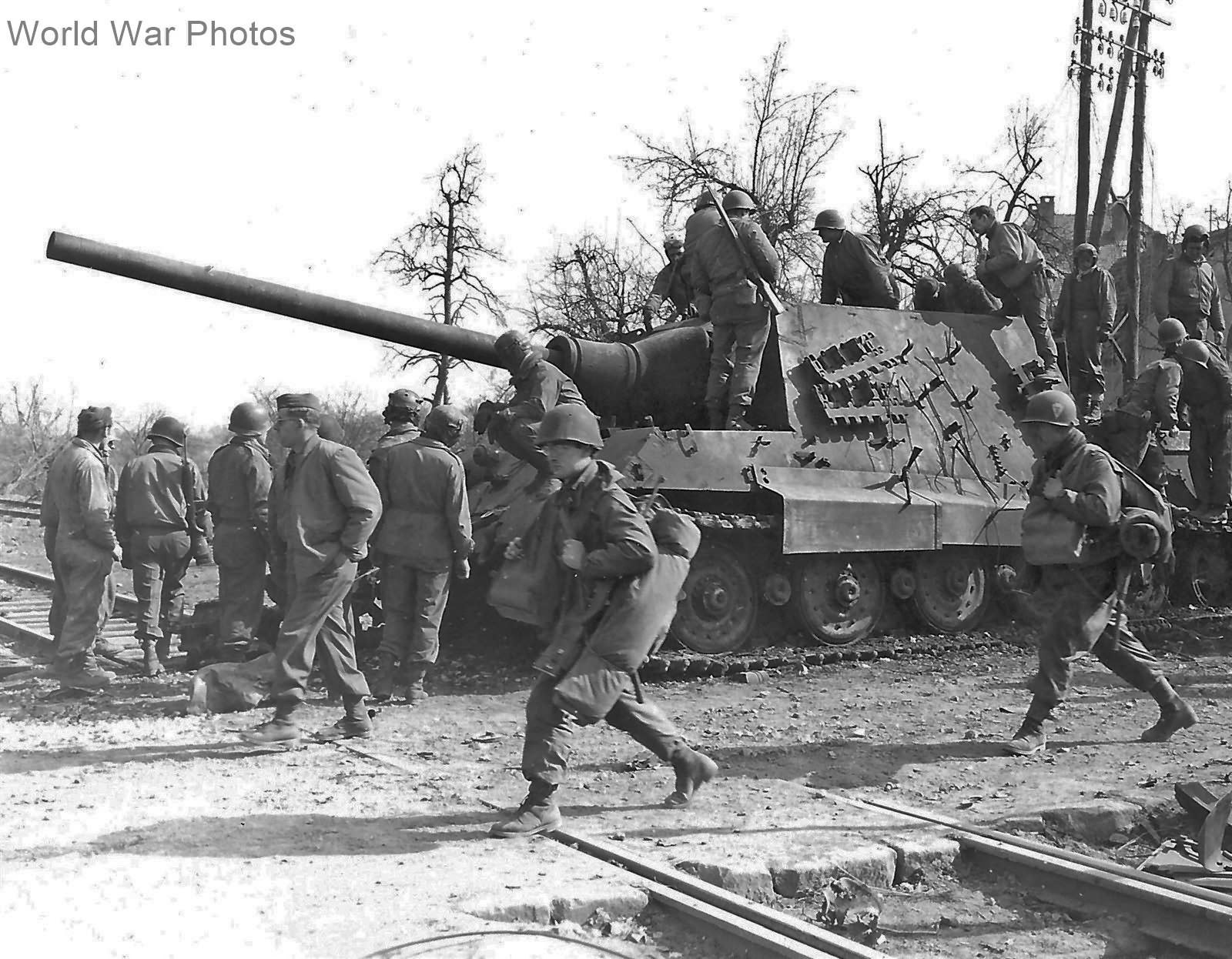 Jagdtiger 234 of the 653 sPzJgAbt and troops from U.S. 36 ID in Soultz France 18 March 1945