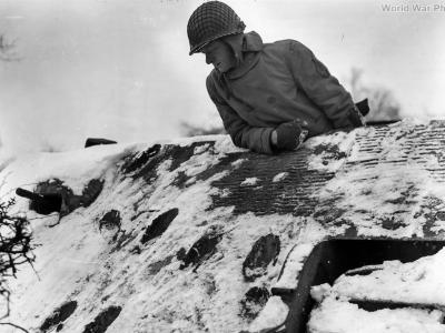 6th Armored GI Examines Hits on Tiger