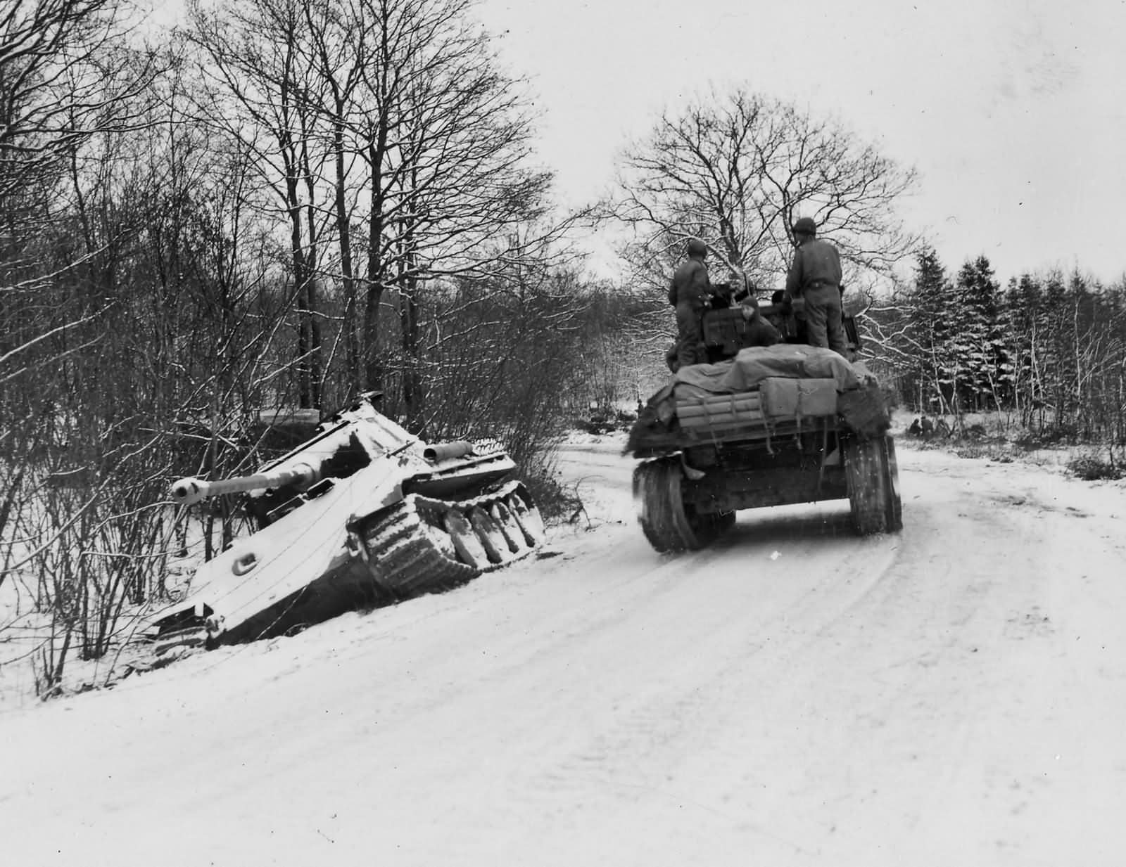 2nd Armored Division M4 Sherman passes german Panther tank Grandmenil Belgium Bulge