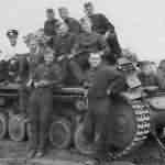 German soldiers posing with Panzer 2 tank
