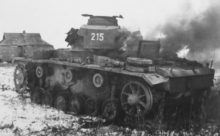 Burning Panzer III tactical number 215