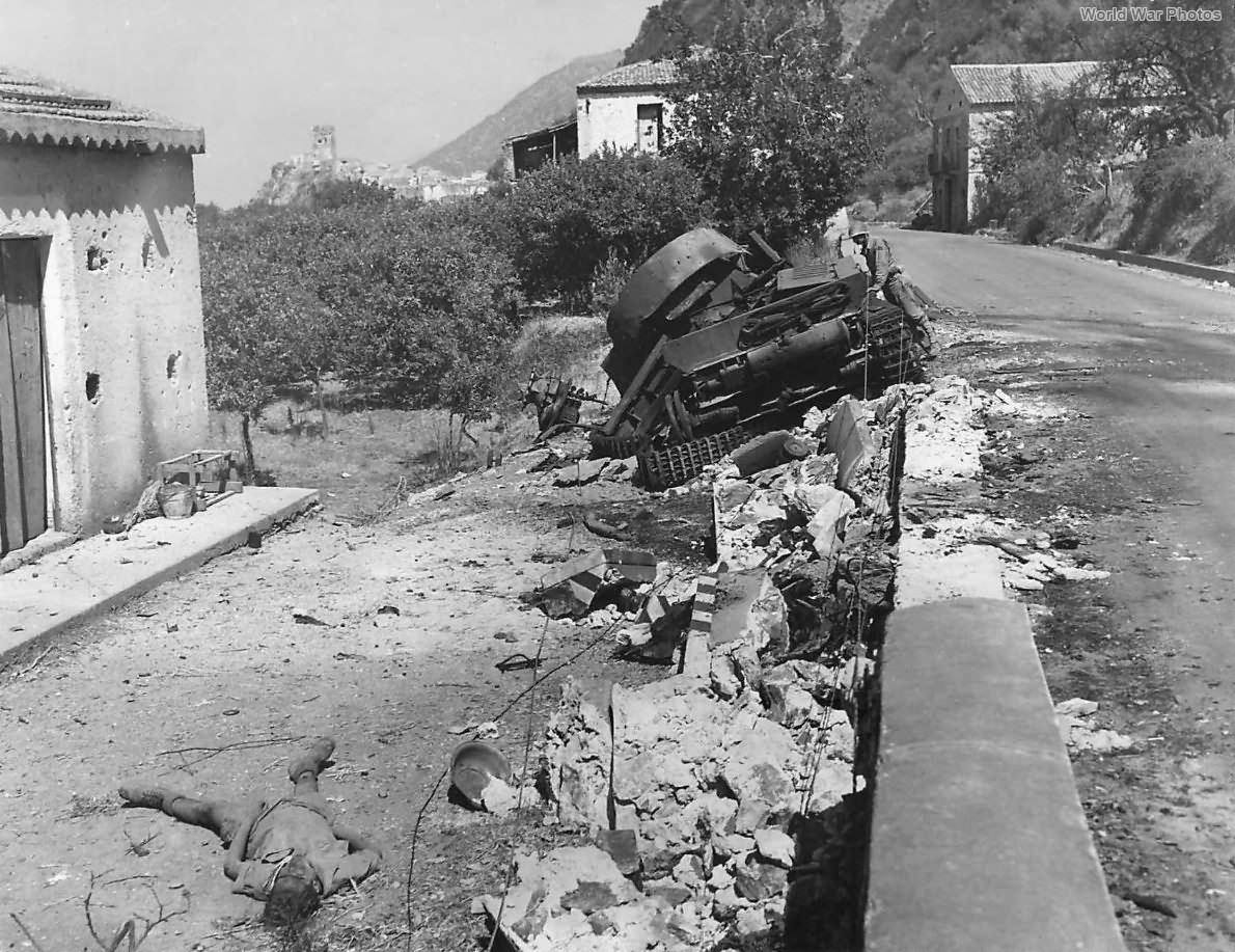 Body German soldier by Knocked Out Panzer IV in Sicily